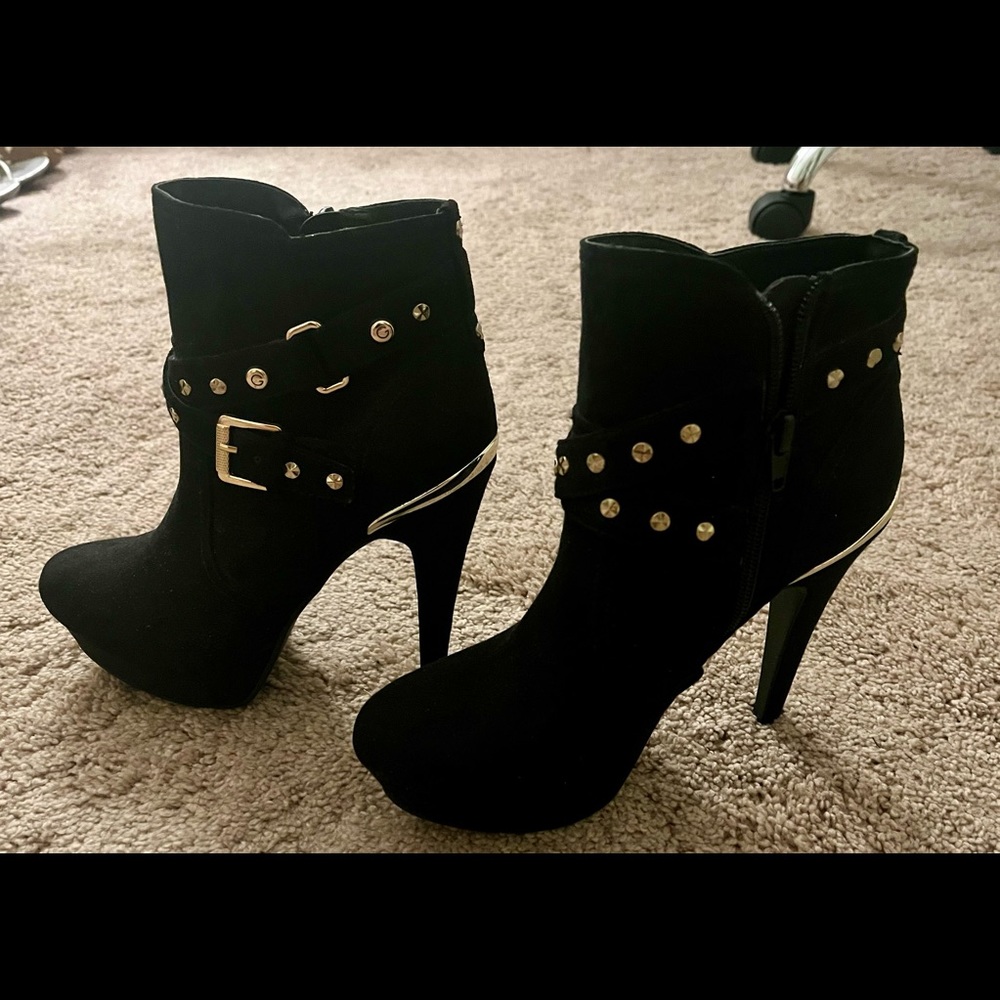 GByGuess black platform boots with gold accessories about 4.5@ high, size 5.5